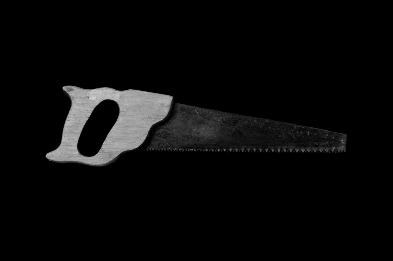 handsaw on a dark background